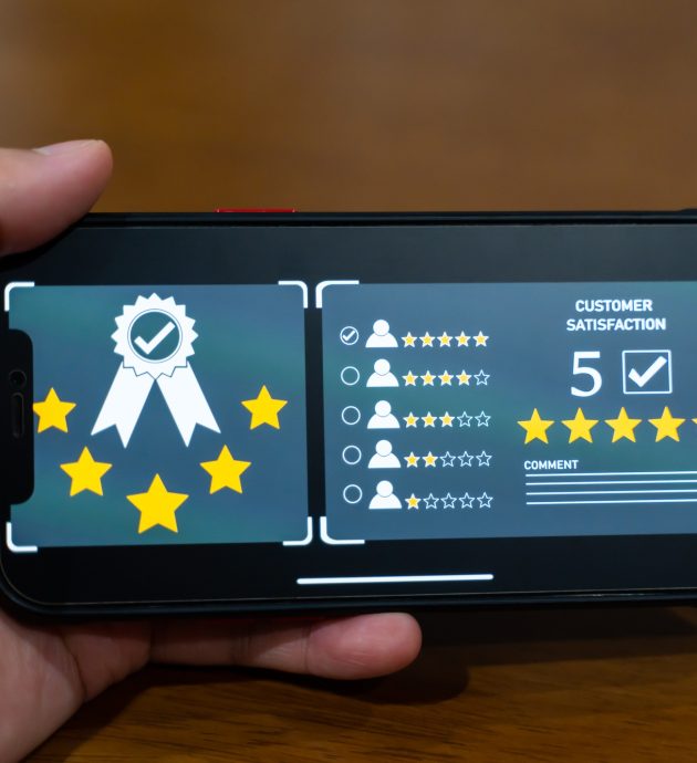 Customer review good rating concept, smile face and five star on screen for positive feedback. Customer review good rating concept, smile face and five star on screen for positive feedback.